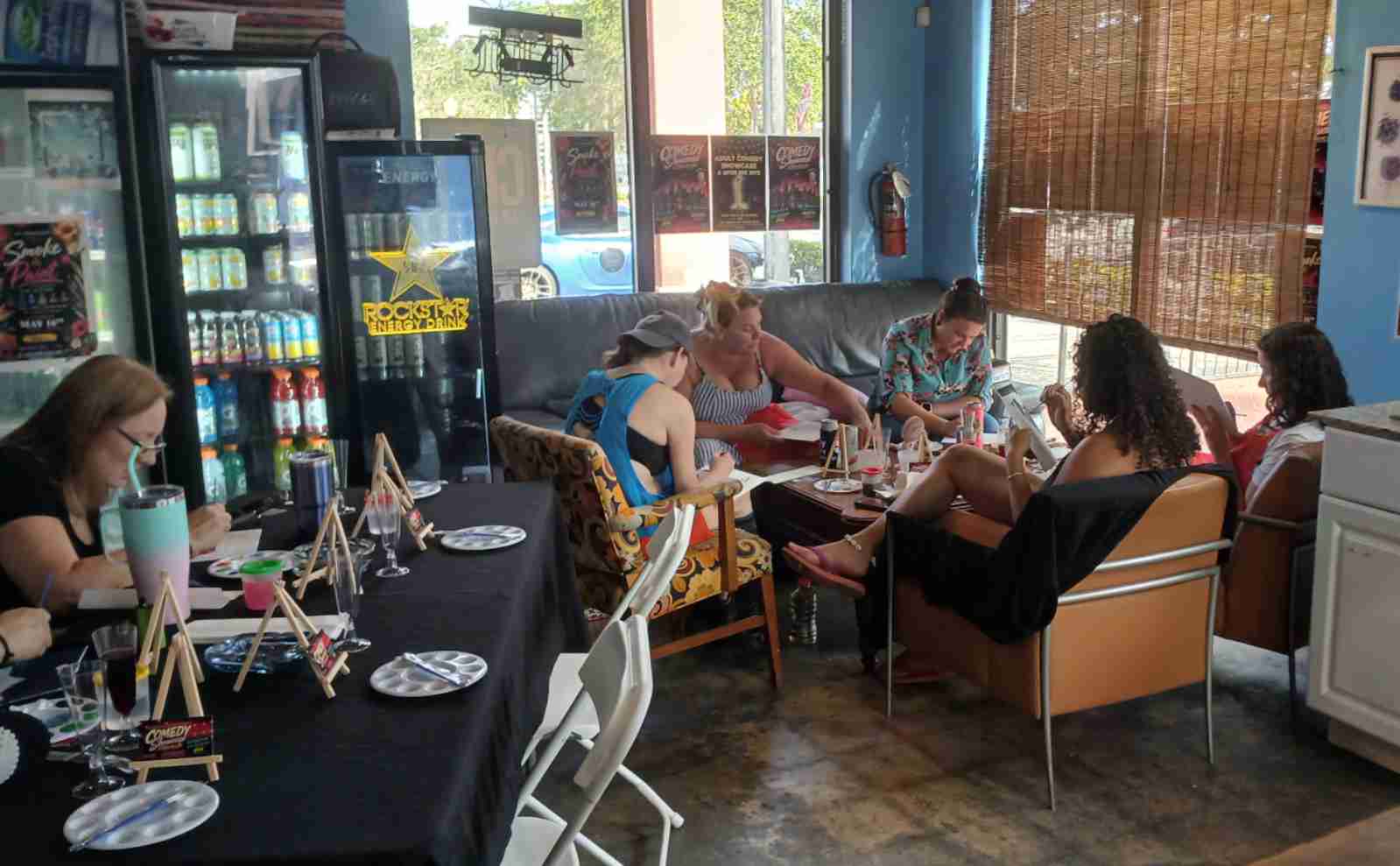 Guests painting at Smoke and Paint